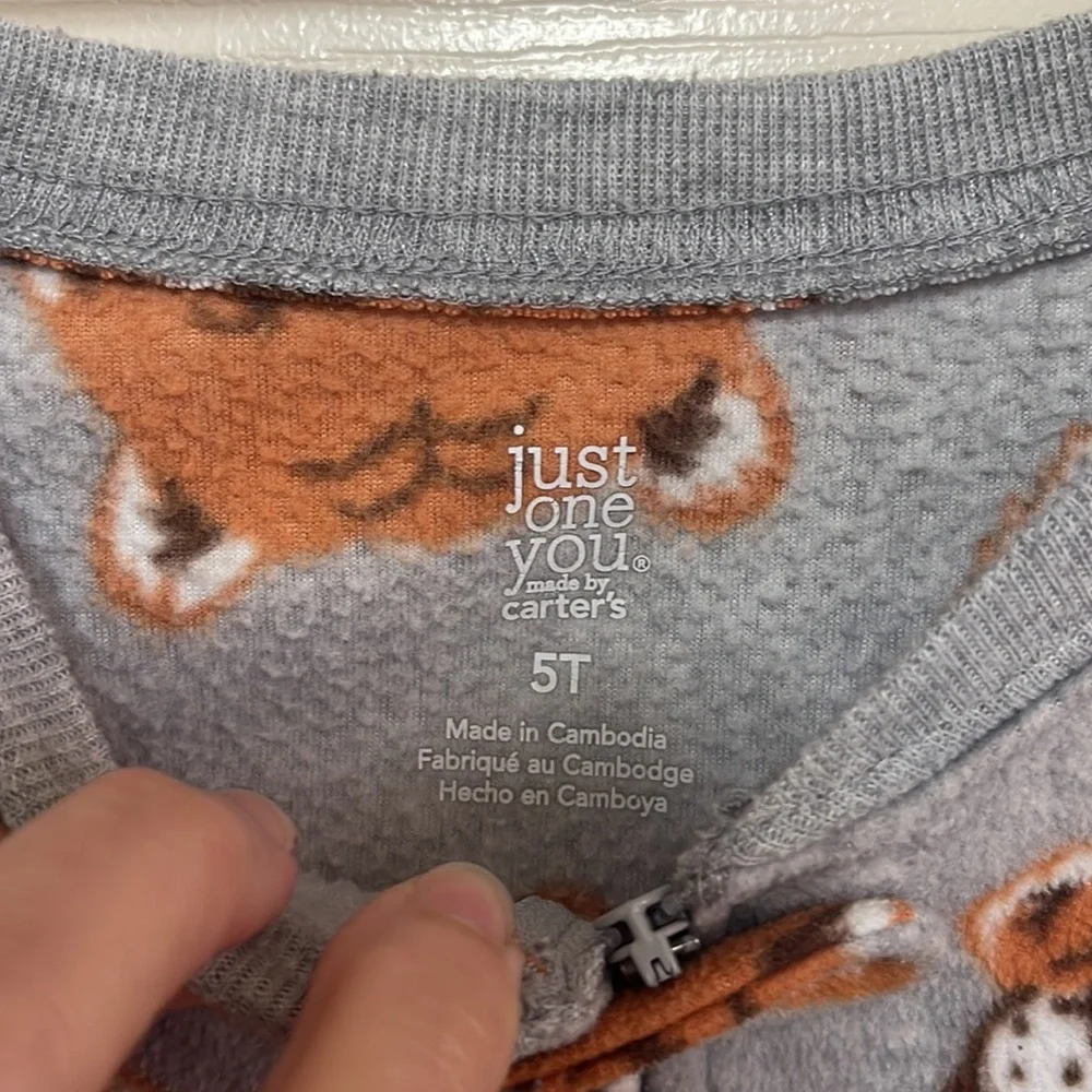 Just one you by Carter’s footed pajamas. Size 5T. Great condition!